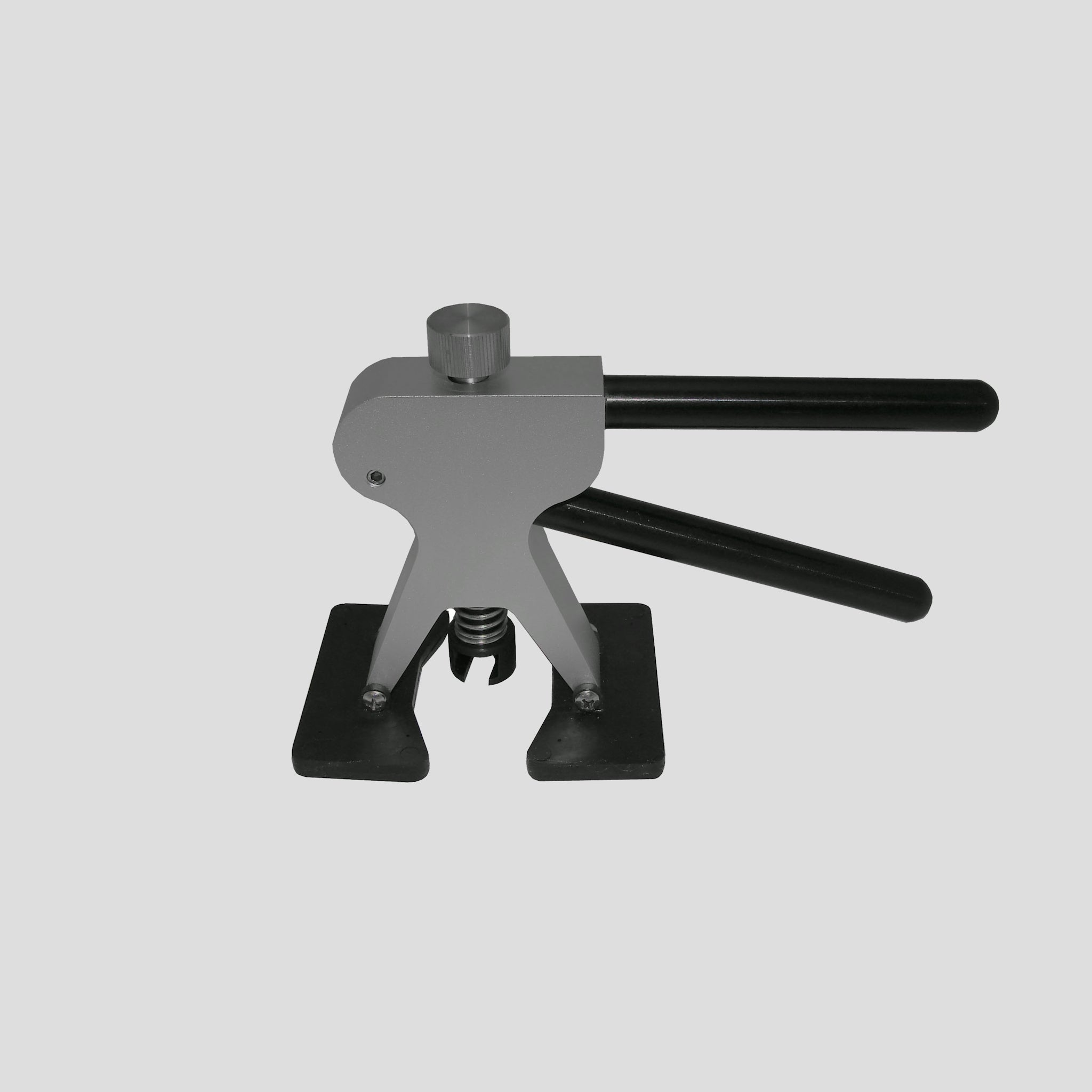 Aluminum mini lifter. Adjustable with rubber feet